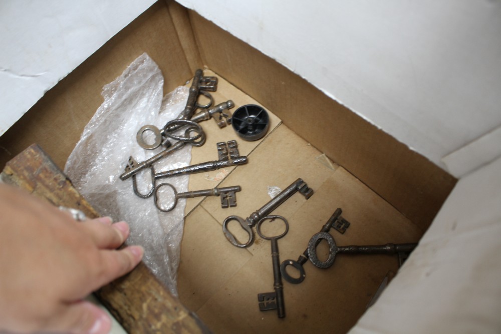 Four assorted old, probably antique, door locks and ten assorted keys